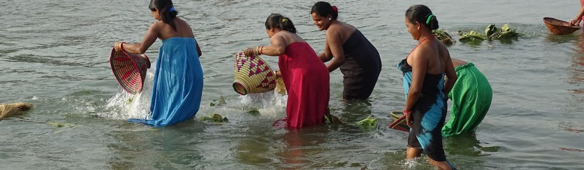 local Tharu people countryside Bardia National Park Tharu women offering food to the gods