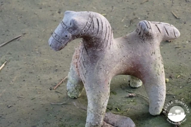 Horse statue worshipping tharu Deity